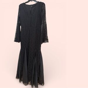 Long black dress size XL never used.